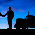 truck drivers shaking hands