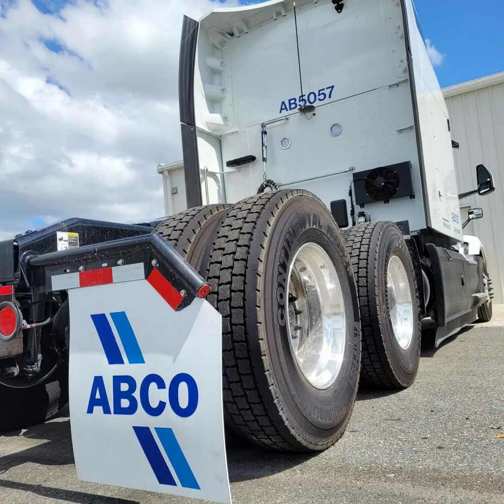 ABCO tractor with tires and ABCO logo panel