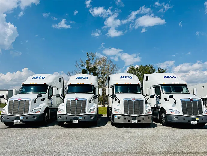 Four ABCO trucks